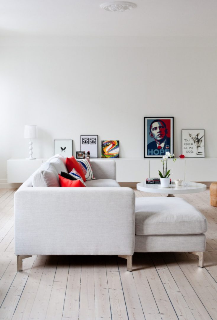 Sofá de un salón de decoración nórdica Sofá de un salón de decoración nórdica